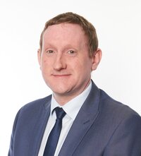 Claims Director Robert Compton